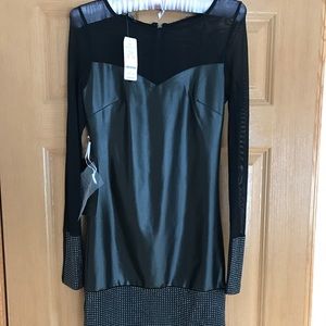 New with tags Bebe black leather long sleeve dress